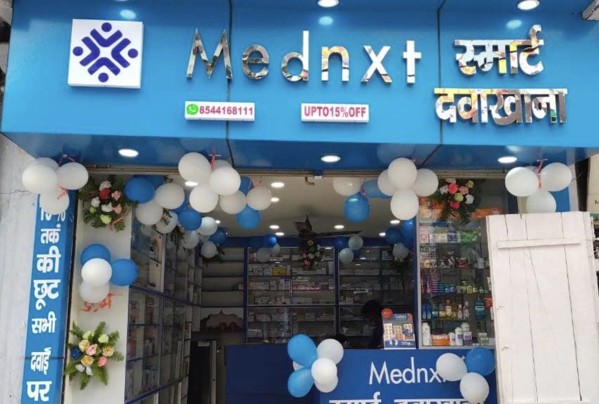 MedNxt Smart Dawakhana shopfront on G.B. Road, Gaya — blue signboard above an open, fully stocked medical store